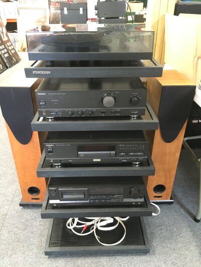 A Rega Planar 3 turntable, a pair of Rega R3 floor standing speakers, Technics SU-610 amp, Technics SL-PS50 CD player and a Technics RS-B465 cassette deck. This comes with a Standesign HiFi stand. Please note all units are wired in to one multi plug.