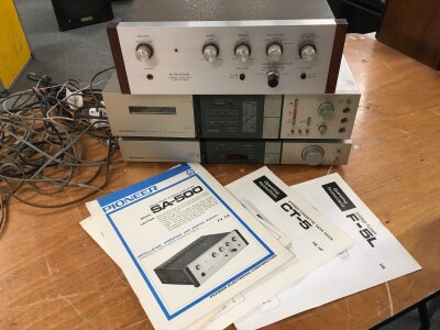 Three vintage Pioneer HiFi separates comprising an SA-500 amp, CT-5 cassette deck (boxed) and an F-5L tuner (boxed), all with manuals, plus a boxed pair of Sennheiser HD414 headphones and an Ekco Bakelite radio.