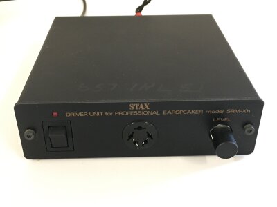 A Stax SRM-Xh earspeaker driver unit with manuals and leads.