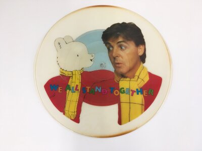 A Paul McCartney uncut picture disc We All Stand Together.