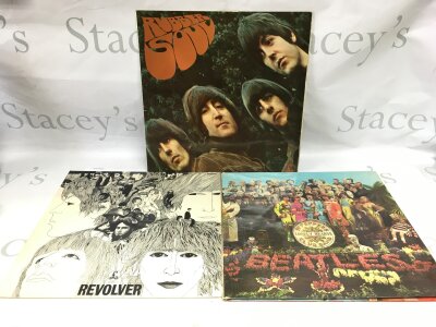 Three early UK mono pressings of Beatles LPs comprising Revolver, Rubber Soul and Sgt Pepper. Generally VG+/EX.
