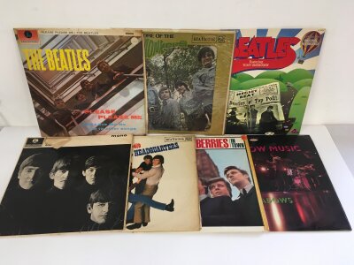 Fifteen rock and pop LPs by various artists including The Beatles, The Monkees, The Shadows and others.