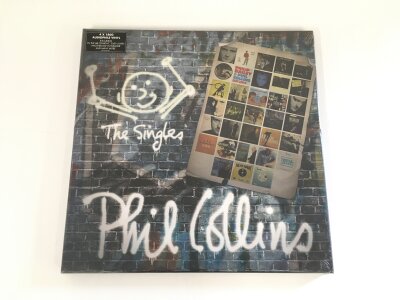 A sealed Phil Collins The Singles 4LP vinyl box set.