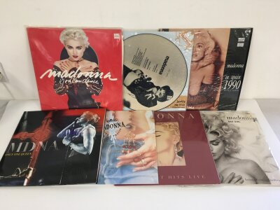 Seven Madonna LPs and 12" singles including Only One Queen, a Justify My Love picture disc, Greatest Hits Live and others.