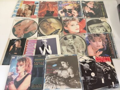 A collection of Madonna 7" singles including Japanese imports plus sealed CD and DVD box sets and Japanese import CDs.