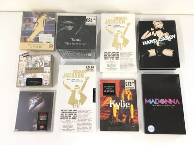 A collection of CD box sets by various artists including Michael Jackson, Madonna, Phil Collins and Kylie Minogue.