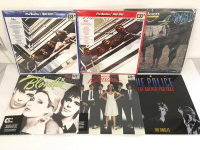 Six LPs by The Beatles, The Jam, Blondie and The Police, mainly sealed.