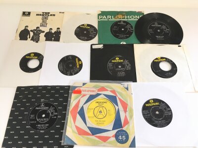 Eleven Beatles 7" singles and EPs including a Twist & Shout demo disc on the Lingasong label plus some foreign pressings etc.