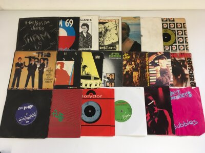 Two bags containing thirty six punk 7" singles by various artists including Sex Pistols, Sham 69, UK Subs and others.