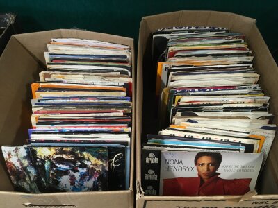 Three small boxes of 7" singles comprising mainly 1980s artists.