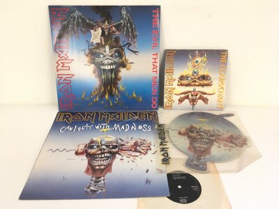 Two Iron Maiden 12" singles plus two 7" single and a picture disc.