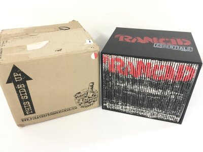 Rancid. A Rancid essentials x46 7" singles compilation vinyl box set on red/white splatter vinyl, flexi included. Limited to 500 only 311/500. Includes original mailer box and Slugger baseball bat. Released in 2012 on Pirates Press Records PPR070.