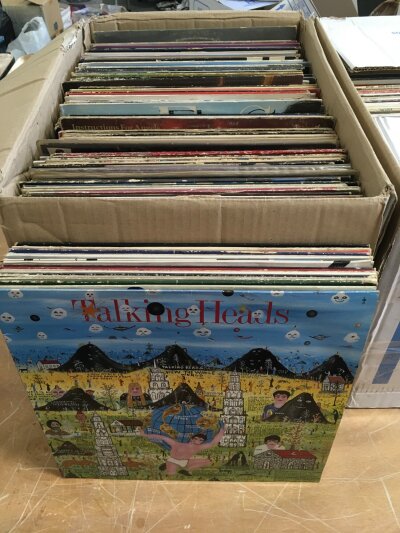 A box of LPs by various artists including Siouxsie & The Banshees, Kraftwerk, The Stranglers and many more.