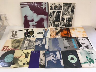 A collection of indie rock LPs and 7" singles by The Smiths, Suede, Stone Roses and others.