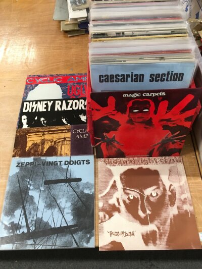A box of 12" singles and LPs by various artists including Led Zeppelin, Mansun, Tangerine Dream and many more.