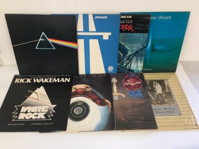 Two bags containing sixteen prog and electronic rock LPs by various artists including Pink Floyd, Tangerine Dream, Kraftwerk and others.