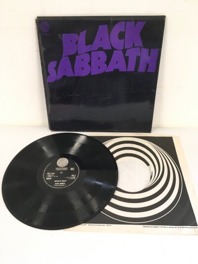 A first UK pressing of the Black Sabbath LP Master Of Reality with Vertigo swirl inner but no poster, Vinyl EX.