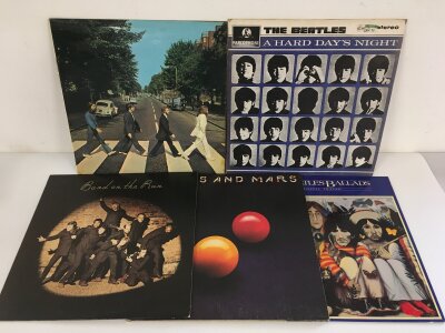 Five Beatles and related LPs comprising a first UK pressing of Abbey Road with misaligned Apple logo on back cover YEX 749-2 / YEX 750-1, A Hard Day's Night and others.