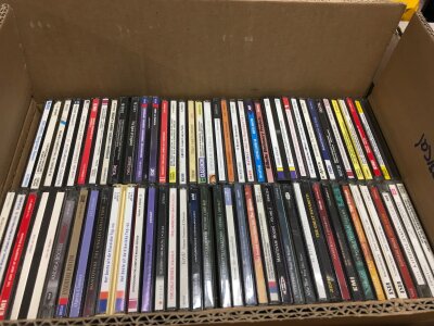 Four boxes of stage musical and classical CDs.