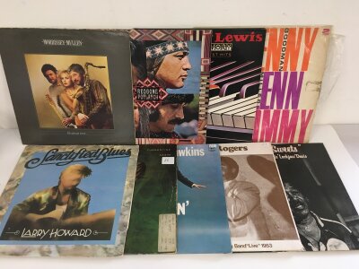 Two bags containing nineteen jazz and blues LPs by various artists including Ramsey Lewis, Ronnie Hawkins, Larry Howard and others.