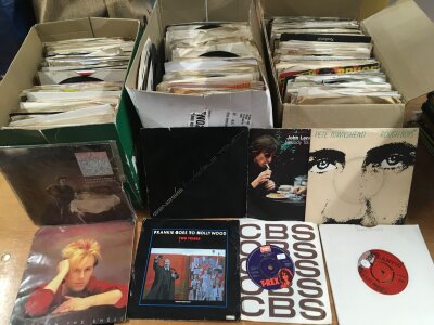 Three boxes of 7" singles by various artists including The Beatles, Deep Purple, Genesis and many more.
