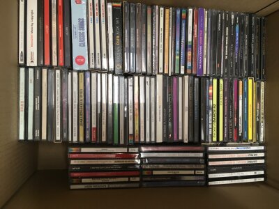Four boxes of CDs by various artists including Alice In Chains, Arctic Monkeys, Nirvana, Metallica and many more.