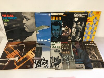 Two bags containing 24 jazz LPs by various artists including Donald Byrd, Charlie Parker, Wes Montgomery and others.