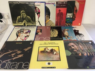 Fourteen  jazz LPs by various artists including John Coltrane, Sonny Rollins, Oscar Brown Jr and others.