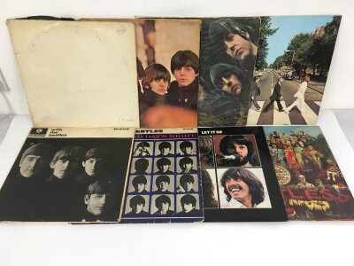 Eight Beatles LPs comprising a numbered White Album 0130837 (missing inserts and a feelable scratch), Let It Be, a German pressing of Sgt Pepper and others.