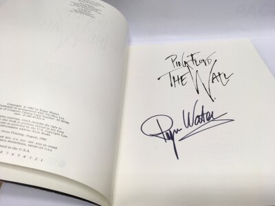 A Roger Waters signed book on The Wall.
