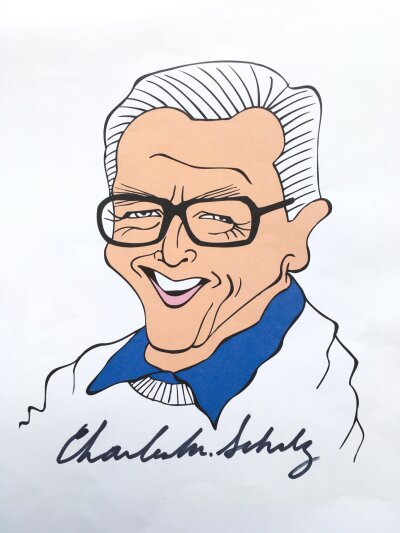 A self portrait print signed by Snoopy creator Charles M Schulz plus a Peanuts cartoon serigraph cel mounted and framed, approx 35.5cm x 28cm.