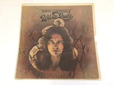 A fully signed Whitesnake LP cover with COA from Roger Epperson.