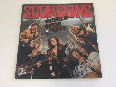 A fully signed Scorpions LP and insert, no COAs. Love At First Sting has no record.
