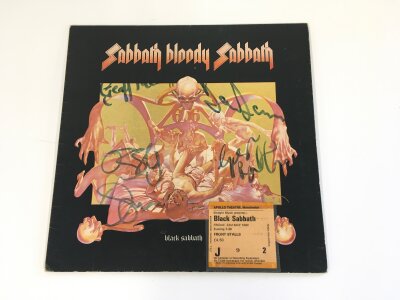 A fully signed Black Sabbath LP with a gig ticket from 23rd May, 1980. No COA.