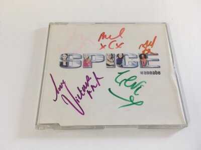 A fully signed Spice Girls CD.