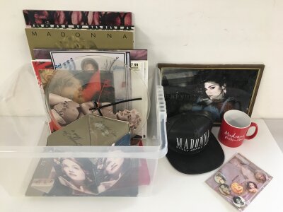 Two boxes of Madonna memorabilia comprising baseball cap, badges, programs, books etc.
