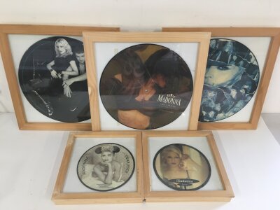 A collection of framed and glazed Madonna CD presentation discs and framed picture discs etc.