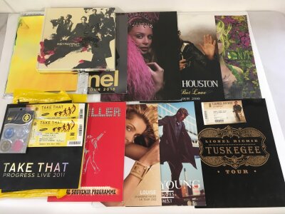 A collection of tour programs, some with tickets,  for various artists including Take That, Kylie Minogue, Duran Duran and others.