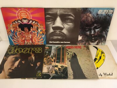 Two bags containing fourteen rock LPs by various artists including Jimi Hendrix (Axis has a feelable scratch), The Doors, Velvet Underground and others.
