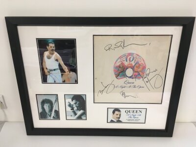 A framed and glazed signed display of the Queen LP A Night At The Opera bearing the signatures of all four band members in black marker pen. Comes with COA from UACC dealer Robert Marshall. Approx 71.5cm x 56cm.