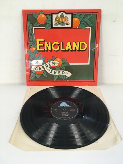A rare first UK pressing of the 1977 psych LP Garden Shed by England, Arista ARTY 153. Vinyl EX sleeve VG+.