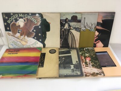 Two bags containing twenty folk rock LPs b various artists including The Byrds, The Band, Joni Mitchell and others.