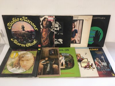 Two bags containing twenty folk rock LPs by various artists including Incredible String Band, Roy Harper, John Martyn and others.