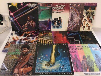 Two bags containing 25 funk and soul LPs by various artists including Herbie Hancock, Earth, Wind & Fire, Al Green and others.