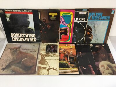 Two bags containing twenty blues LPs by various artists including Son House, Albert King, Furry Lewis and others.