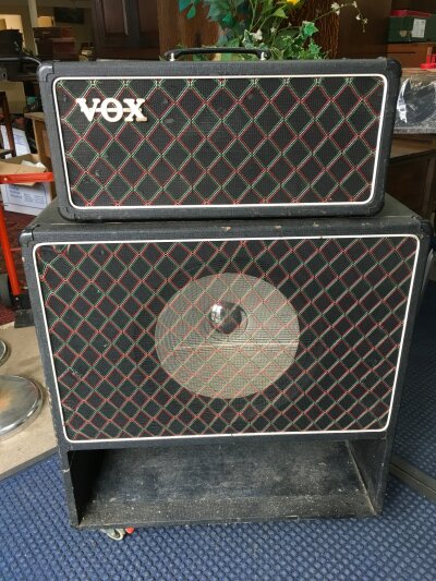 A circa early 1970s Vox AC50 amp head, serial number 5676 plus a matching bass reflex cabinet, serial number 82035.