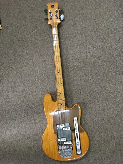 A rare Hayman 4040 bass guitar. These hand crafted instruments were built for a short period between 1971 and 1973 with design input from Jim Burns and Bob Pearson. This particular example is in a natural finish with the serial number 5524. Comes with a hard carry case.