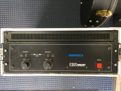 Two Harrison P900 professional power amps, stereo 400W per channel into 4 ohms (bridgeable). Harrison were successors to HH Electronics of Cambridge. Both housed in flight cases.