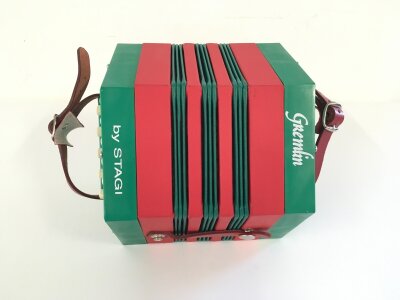 A Gremlin Anglo student concertina, entry level 30 key instrument made by Stagi, Italy.
