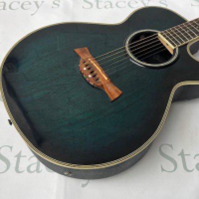 A Crafter FX550EQ Electro Acoustic Guitar with LR Baggs internal pickup and preamp. Translucent dark turquoise blue. Unplayed with no evidence of playwear or fretwear. No case.